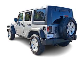 Used 2015 Jeep Wrangler Unlimited Sport with VIN 1C4BJWDG6FL754205 for sale in Casper, WY