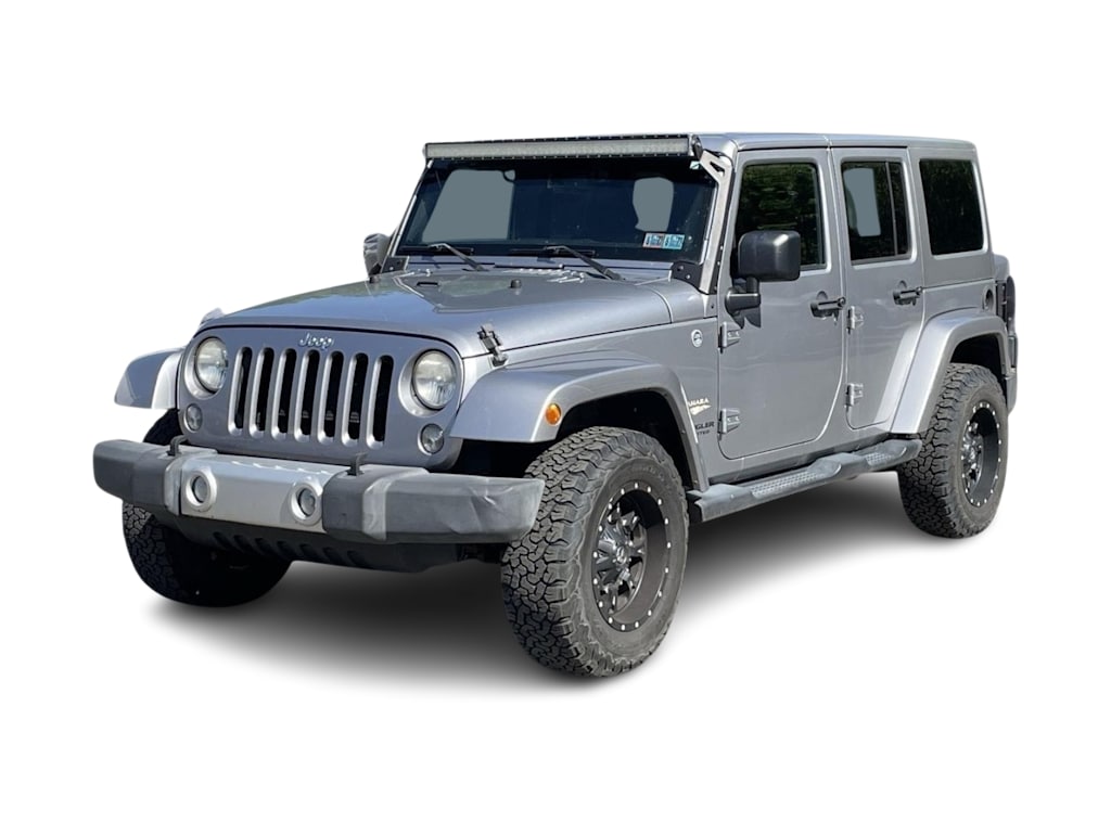 Used 2014 Jeep Wrangler Unlimited Sahara with VIN 1C4BJWEG6EL118073 for sale in Casper, WY