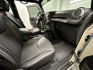 Used 2017 Jeep Wrangler Unlimited Freedom Edition with VIN 1C4BJWDG4HL571100 for sale in Casper, WY
